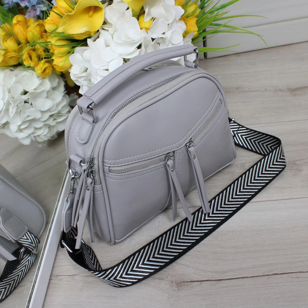 Сіра сумка крос-боді практична для подорожей