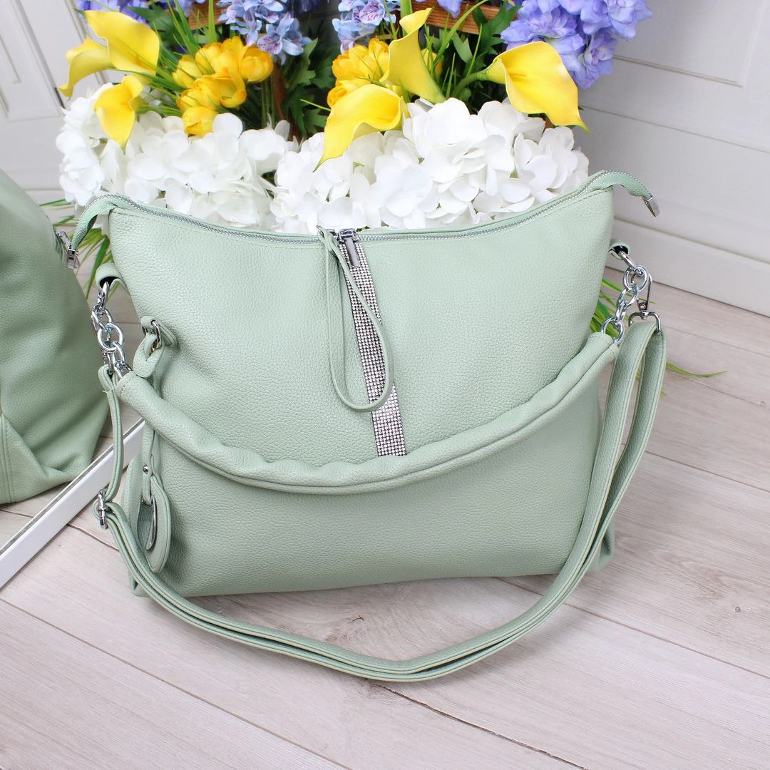 Жіноча сумка-мішок кольору фісташка для яскравих образів