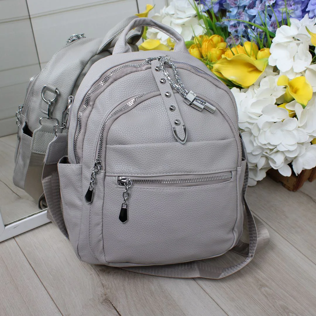 Жіноча сумка-рюкзак сіро-лілового відтінку для мінімалістки