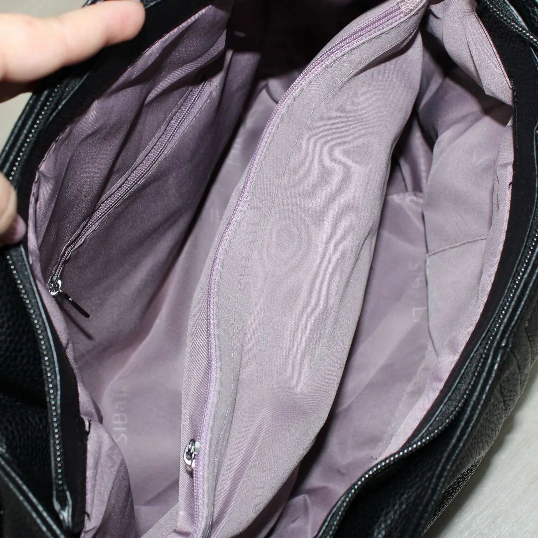 Жіноча сумка-мішок з еко-шкіри чорного кольору для міста