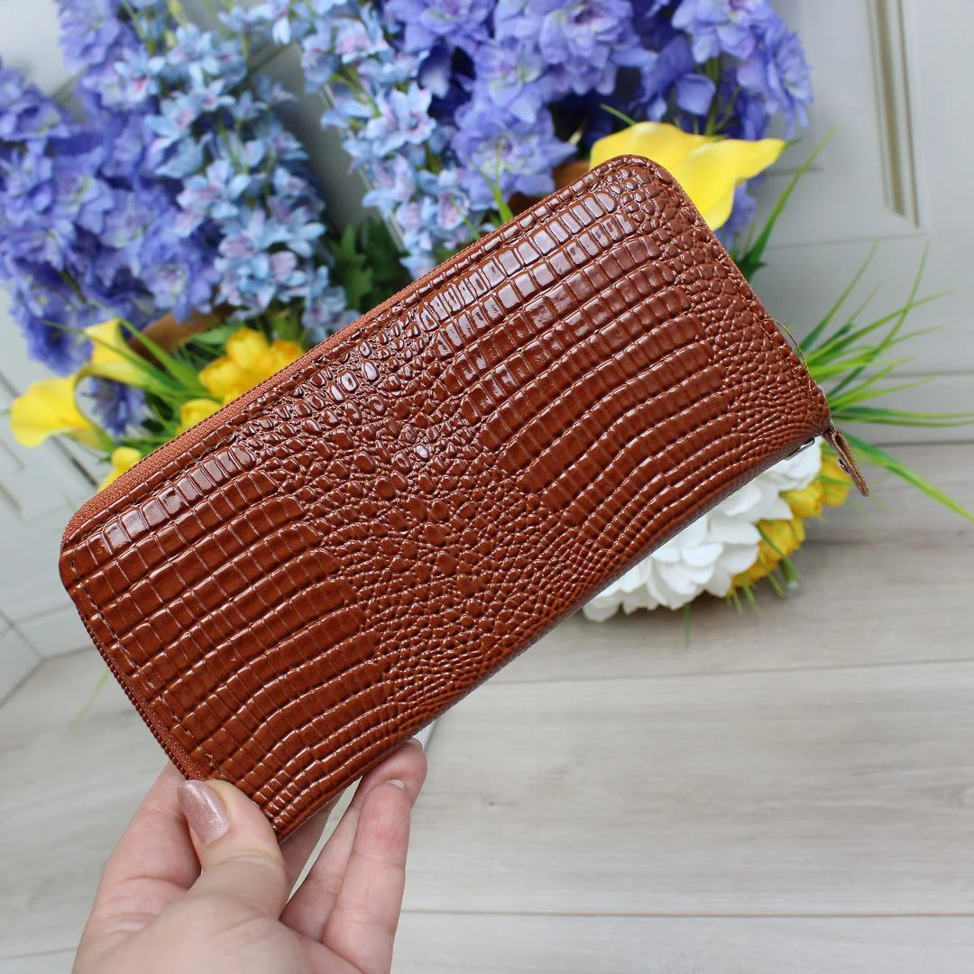 Жіночий гаманець рудий: вигідне поєднання ціни та якості