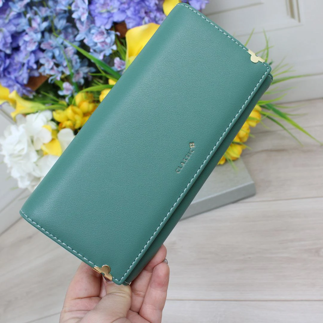 Стильний гаманець зелений: порядок серед дитячих дрібничок