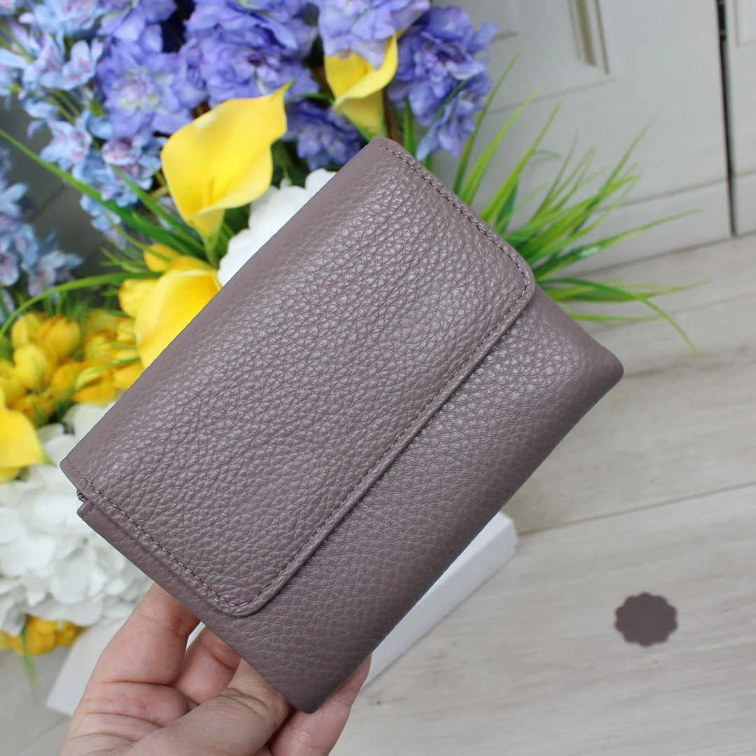 Стильний гаманець пудра: порядок серед дитячих дрібничок