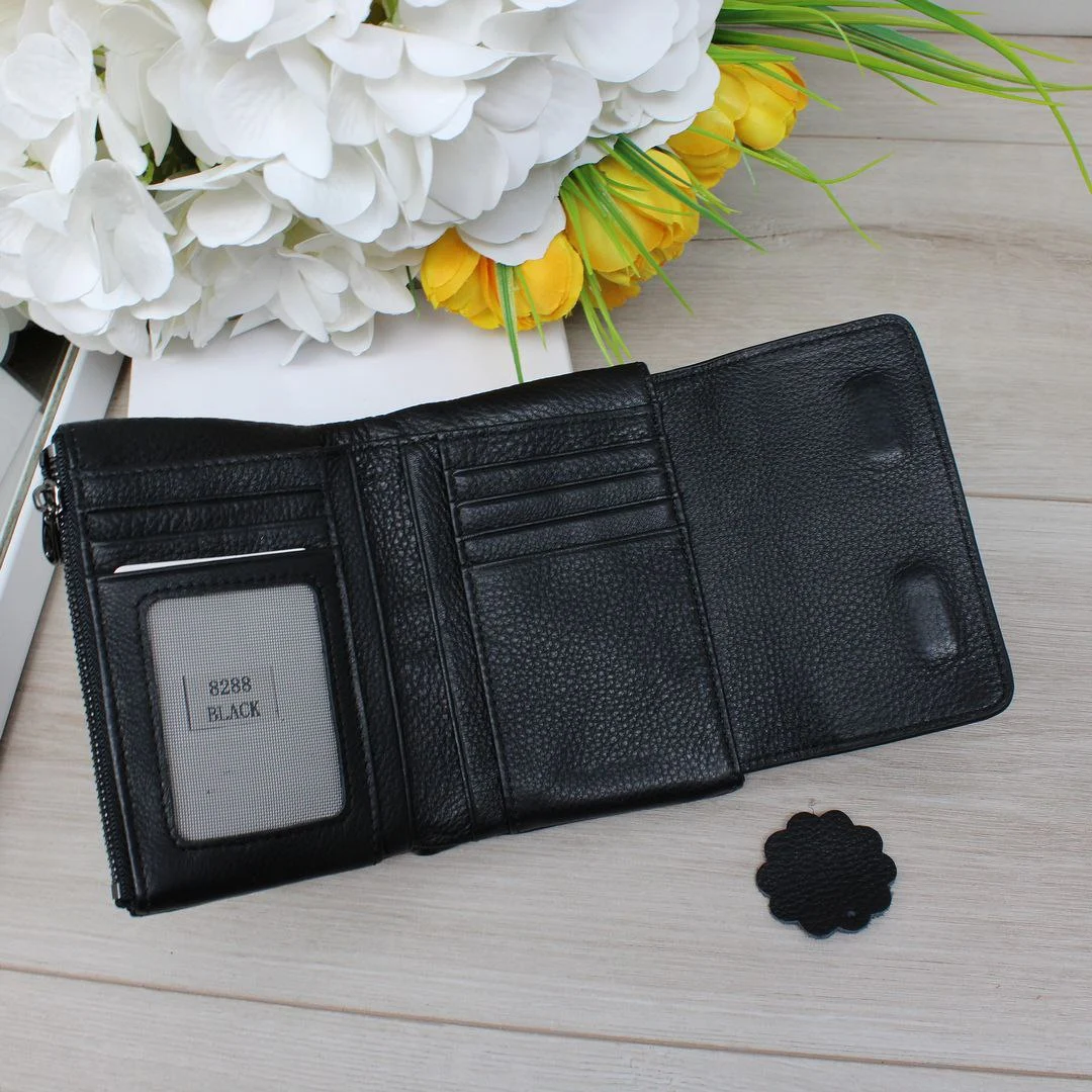 Класичний гаманець чорний: розумна покупка для економних