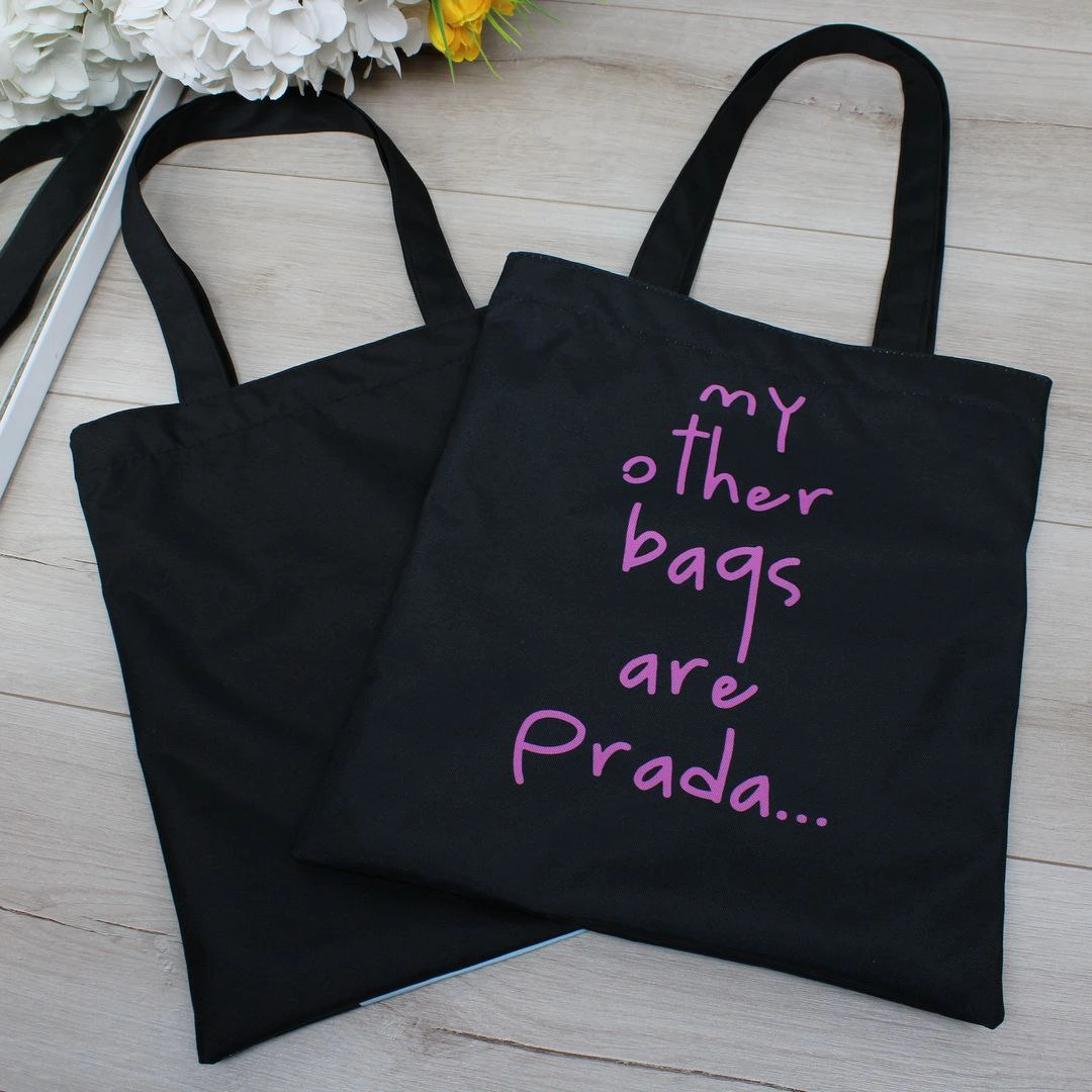 Жіноча сумка-шопер з принтом для мам: містка та зручна