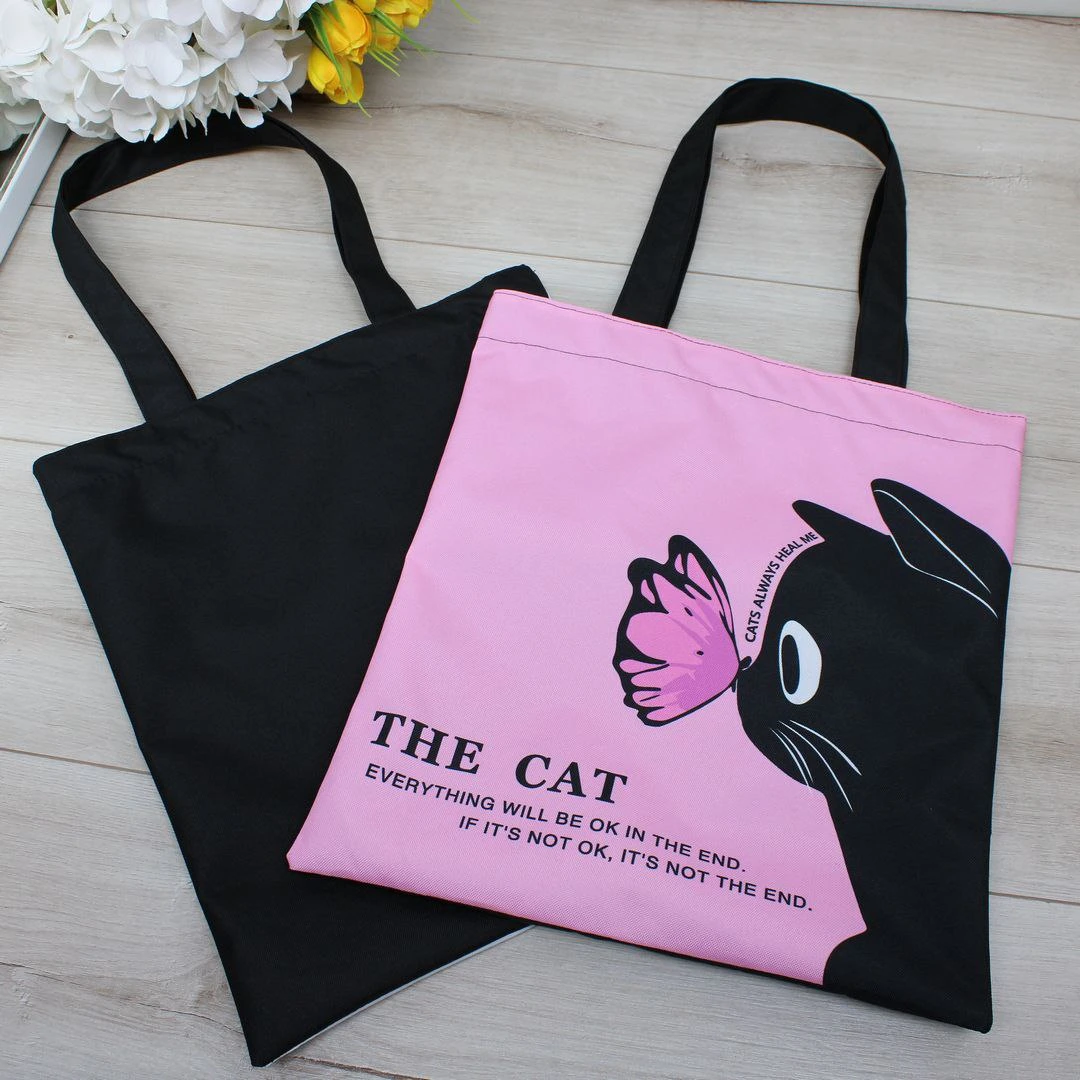 Жіноча сумка-шопер з принтом як ручна поклажа в літак