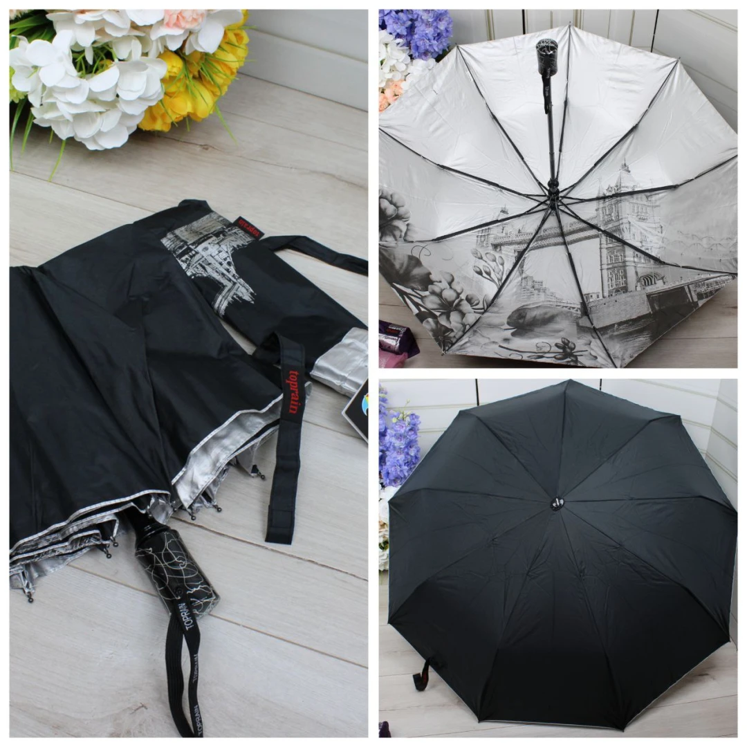 Чорна парасолька напівавтомат з однотонним куполом і декоративним візерунком усередині