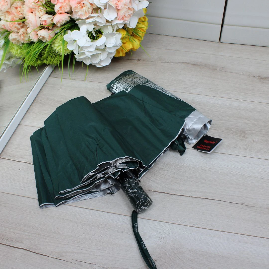 Жіноча зелена парасолька напівавтомат з однотонним куполом та декоративним візерунком усередині