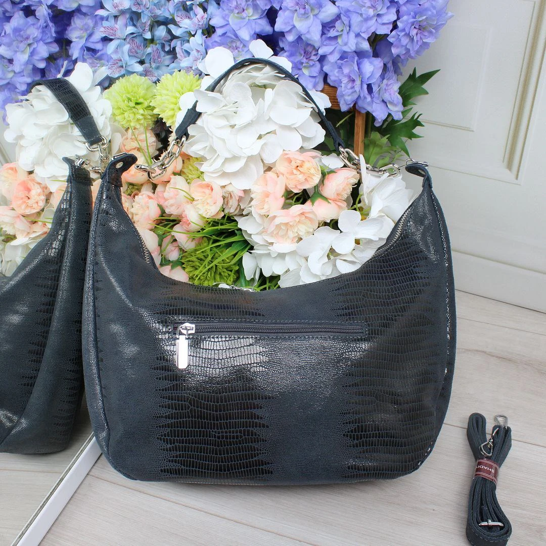 Жіноча блакитна сумка-мішок з натуральної шкіри