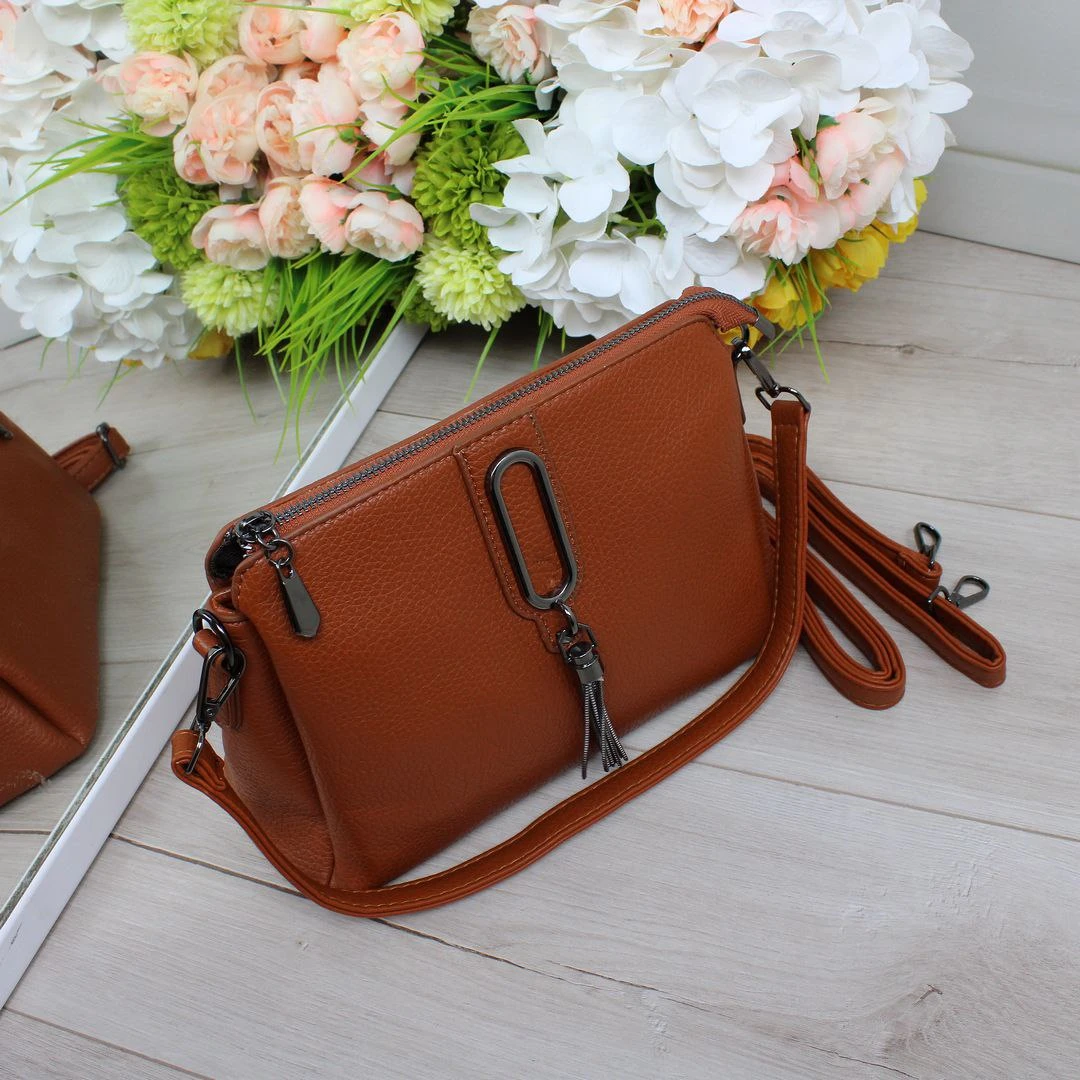 Жіноча руда сумка через плече з екошкіри на три відділення