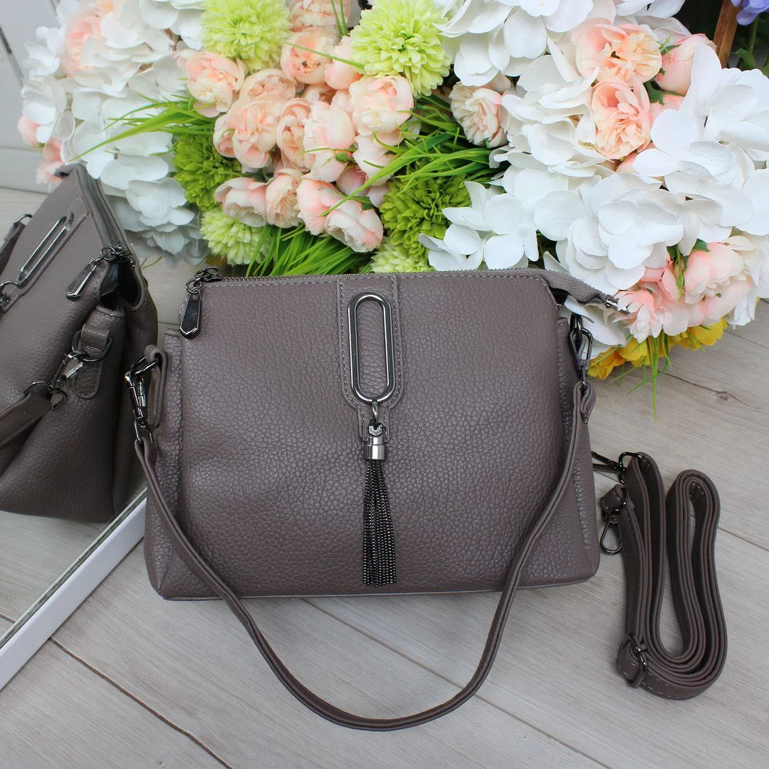 Жіноча сумка пильної троянди з екошкіри через плече на три відділення