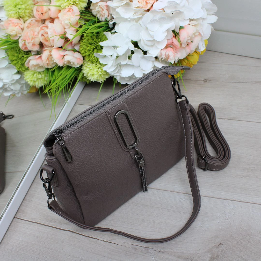 Жіноча сумка пильної троянди з екошкіри через плече на три відділення