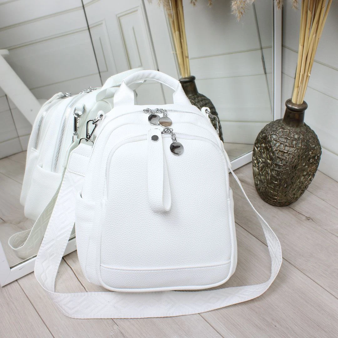Жіноча біла сумка-рюкзак трансформер з екошкіри
