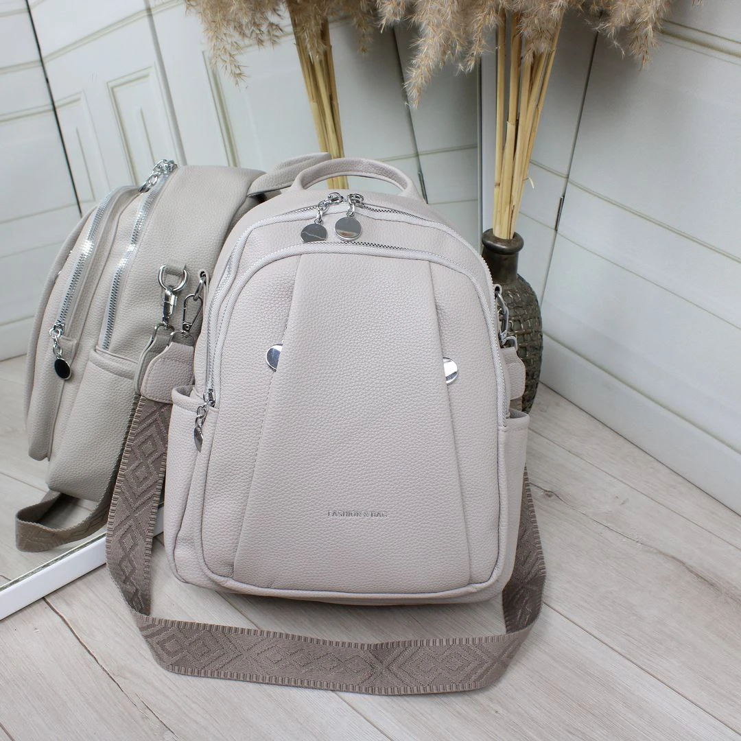 Жіноча сіро-лілова сумка-рюкзак з екошкіри з широким ременем