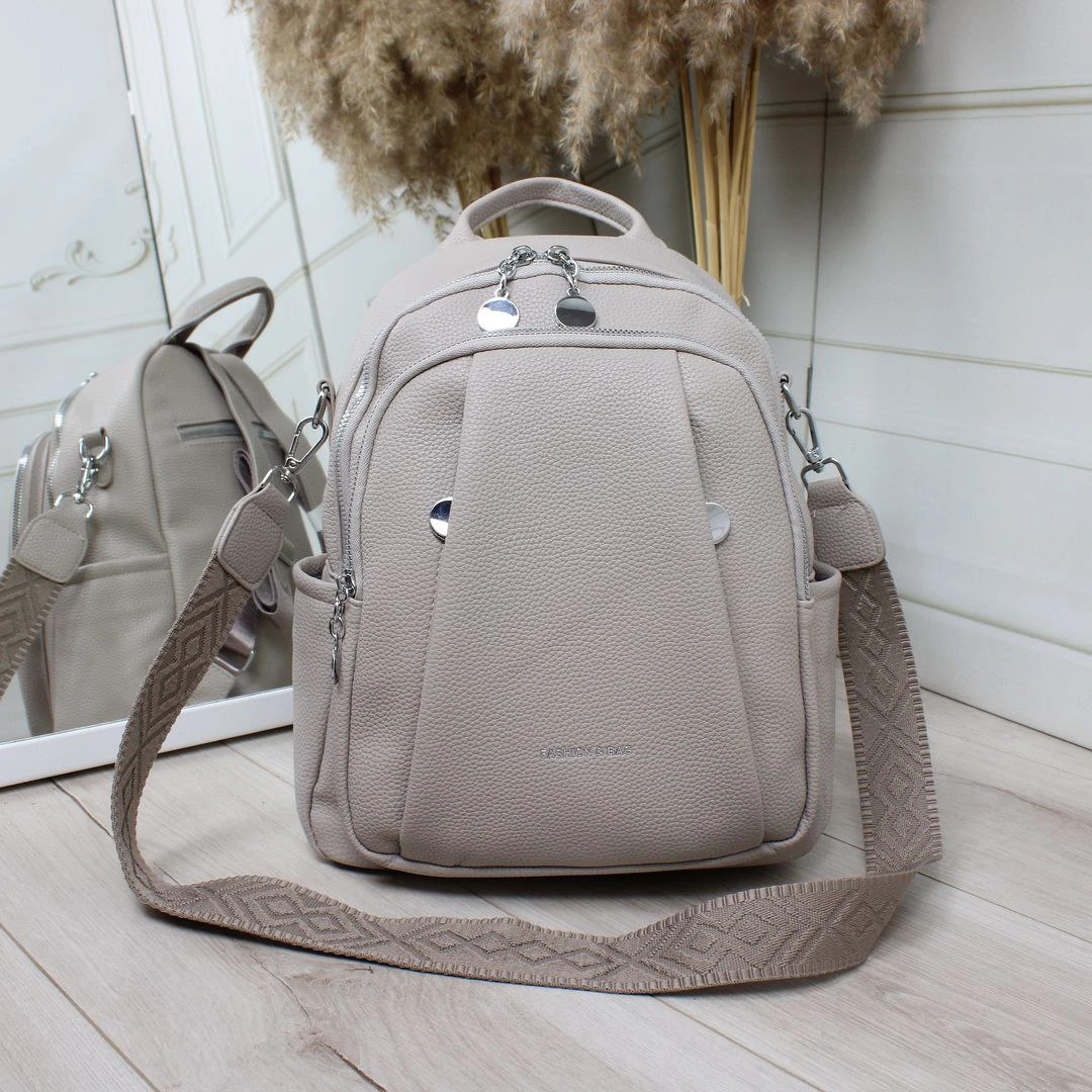 Жіноча сіро-лілова сумка-рюкзак з екошкіри з широким ременем