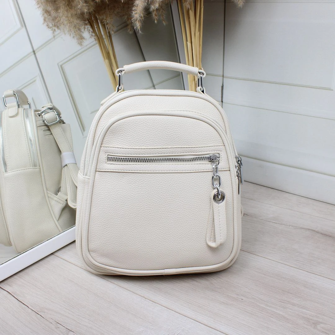 Жіноча молочна сумка-рюкзак трансформер з екошкіри