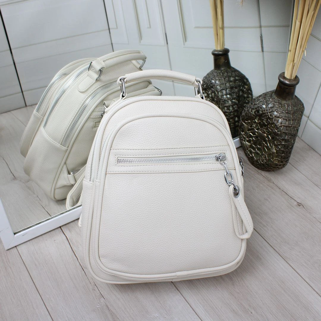 Жіноча молочна сумка-рюкзак трансформер з екошкіри