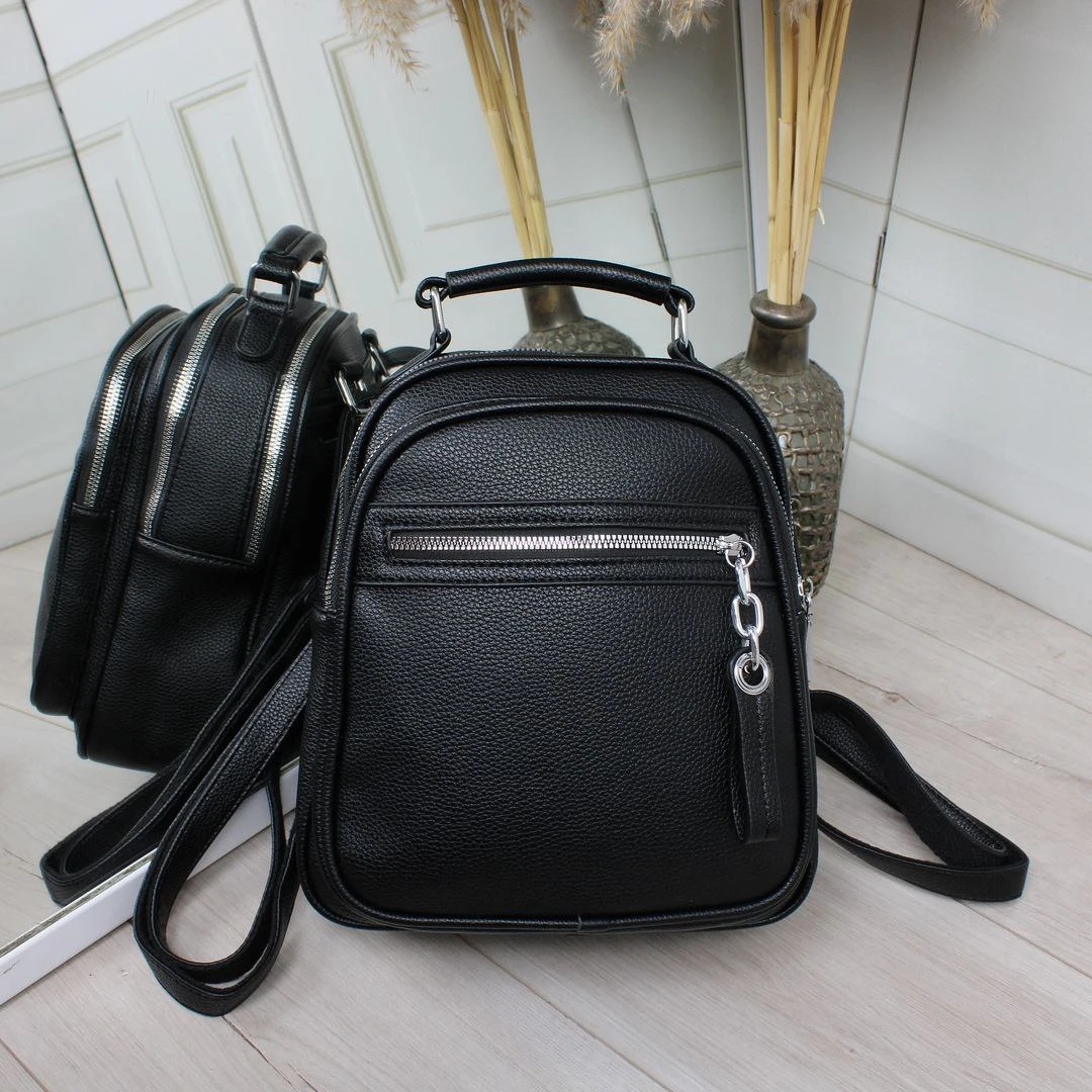 Чорна жіноча сумка-рюкзак трансформер з екошкіри на два відділення
