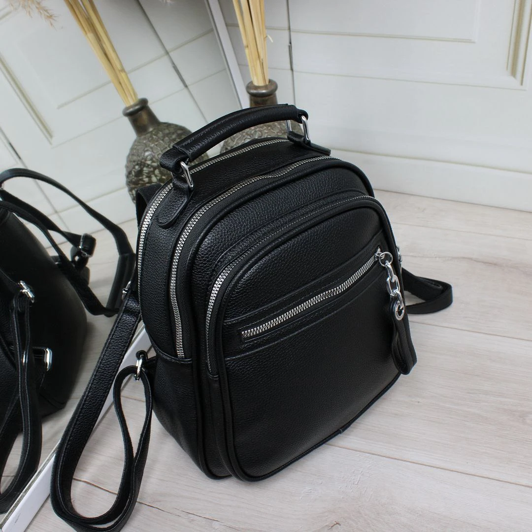 Чорна жіноча сумка-рюкзак трансформер з екошкіри на два відділення