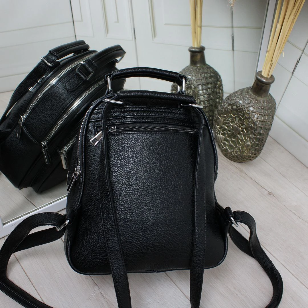 Чорна жіноча сумка-рюкзак трансформер з екошкіри на два відділення