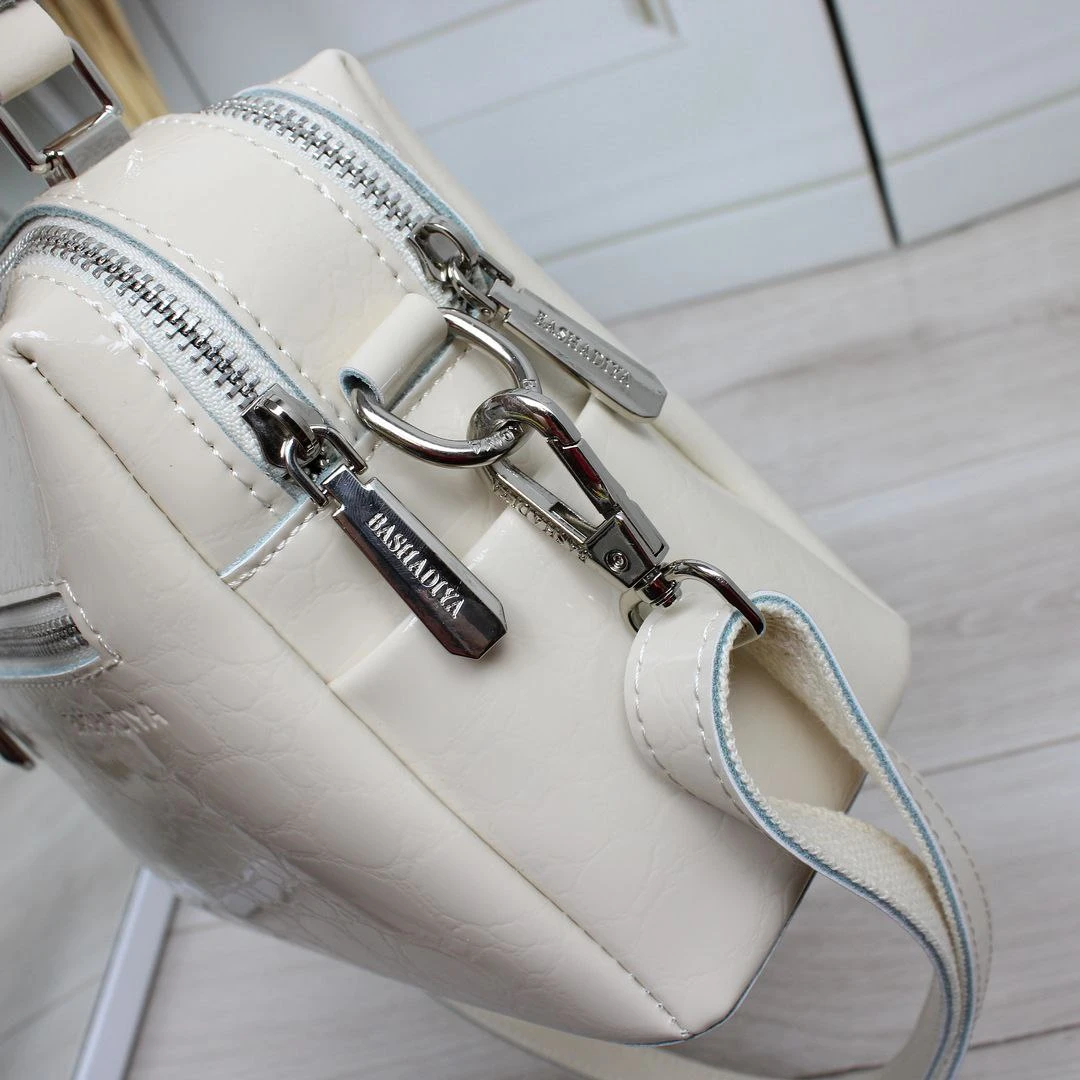 Жіноча молочна сумка через плече крос-боді з натуральної шкіри на два відділення