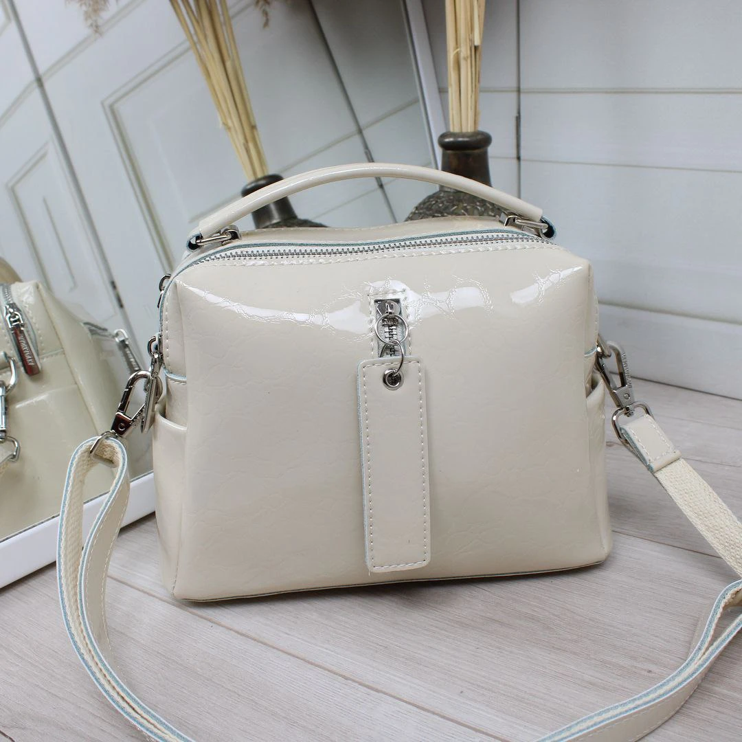 Жіноча молочна сумка через плече крос-боді з натуральної шкіри на два відділення