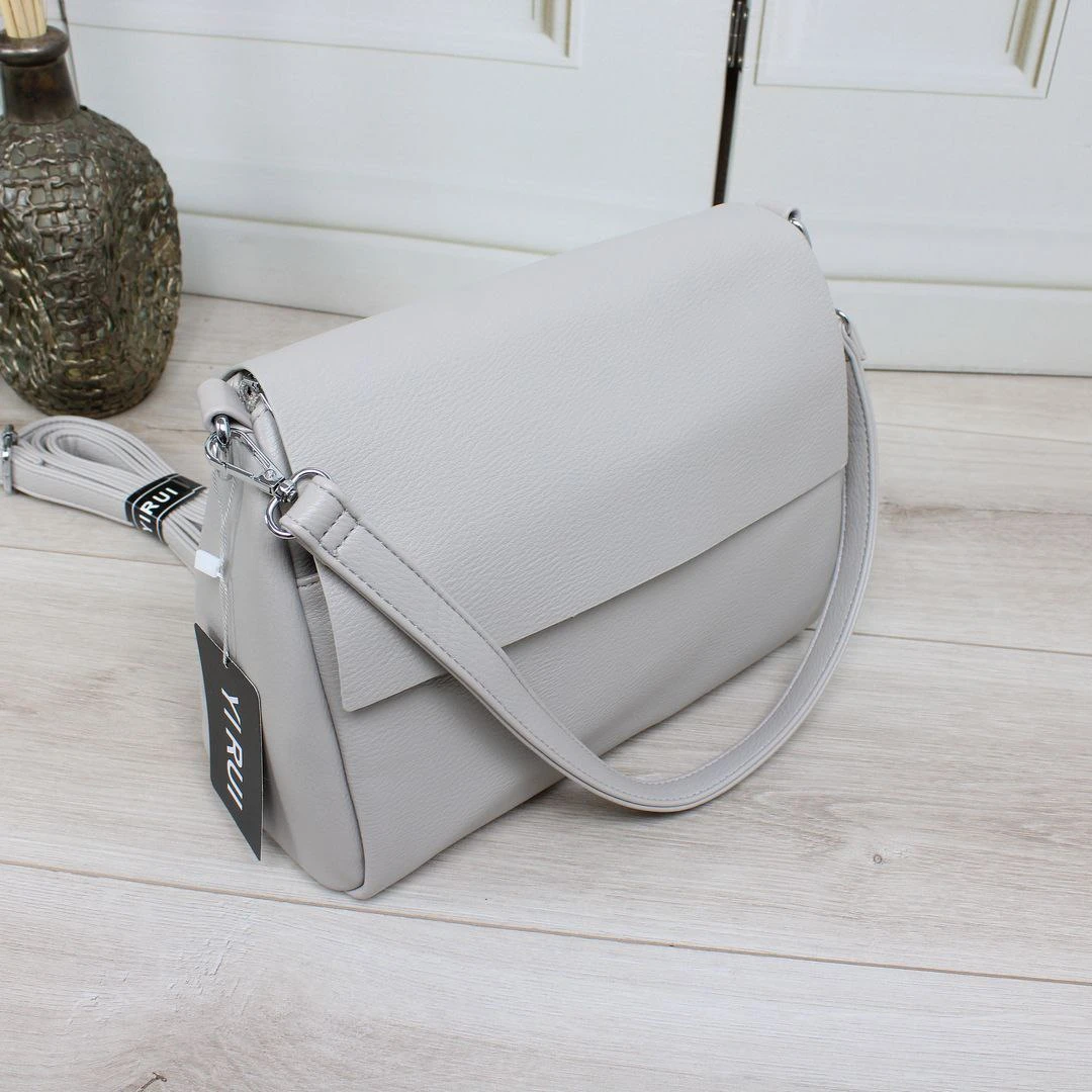 Світло-сіра жіноча сумка крос-боді через плече з екошкіри