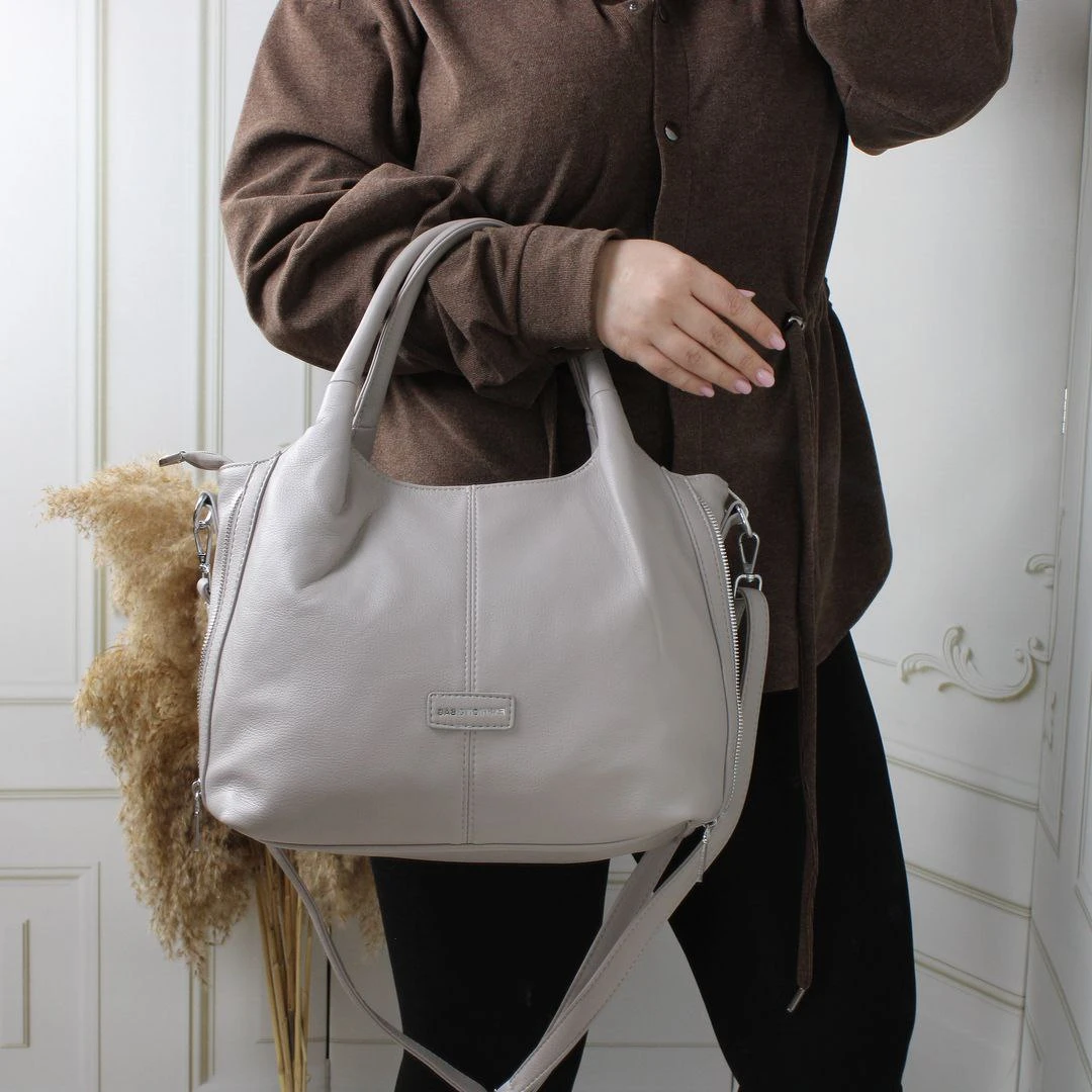 Жіноча світло сіро-лілова сумка А4 з екошкіри з боковими блискавками