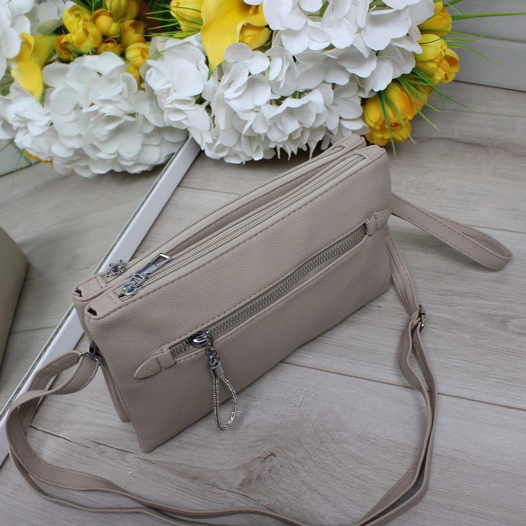 Жіноча сумка крос-боді беж для подорожей з регульованим ремінцем