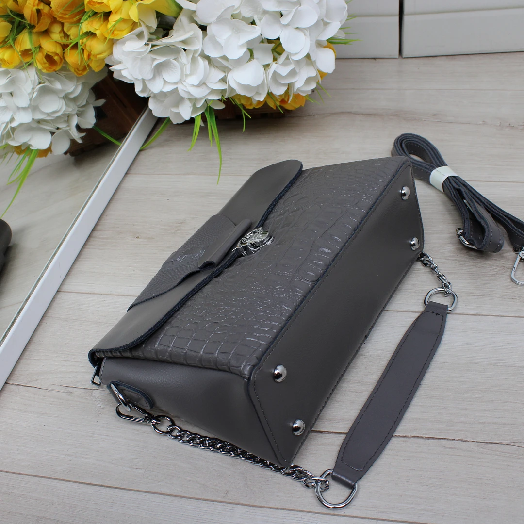 Ергономічна сумка крос-боді графітового кольору для подорожуючих