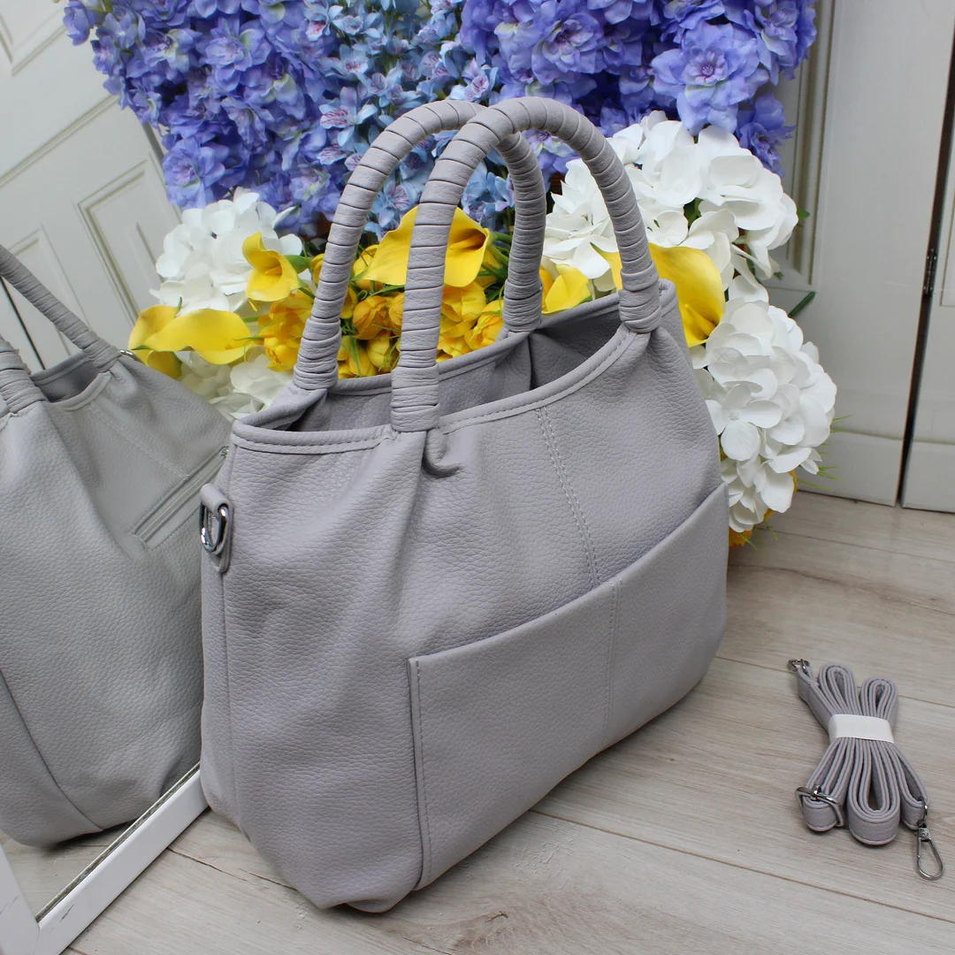 Жіноча сумка-мішок лілова з еко-шкіри для поетичних образів