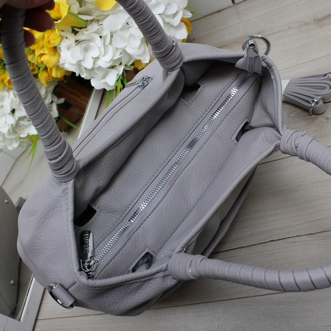 Жіноча сумка-мішок лілова з еко-шкіри для поетичних образів