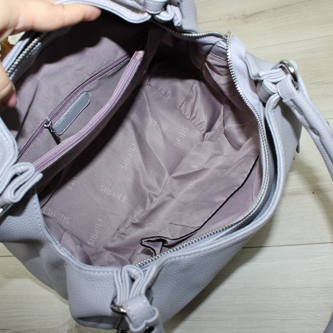 Жіноча сумка-мішок фіолетова з еко-шкіри для творчих пошуків