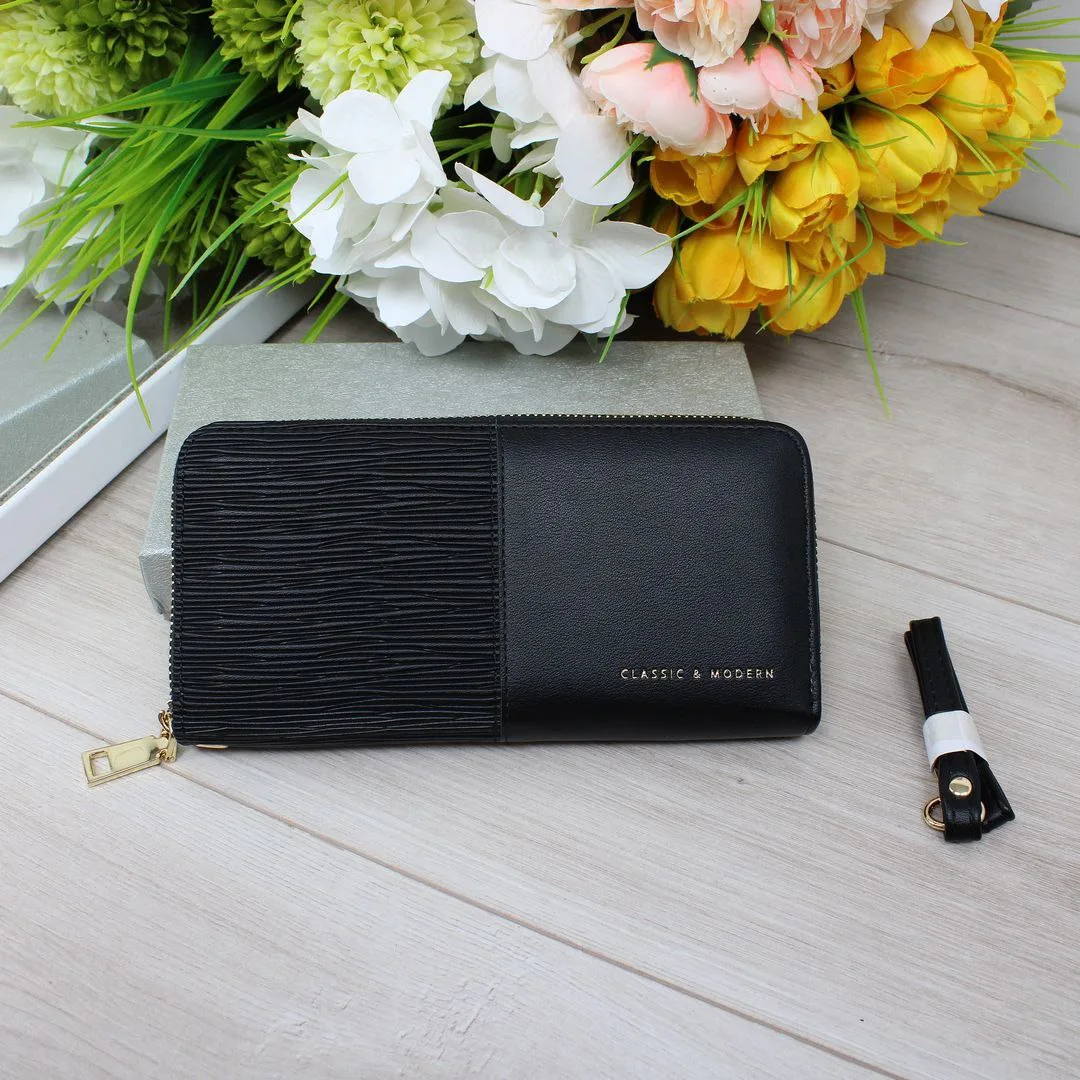 Класичний гаманець чорний: акуратність у діловому стилі
