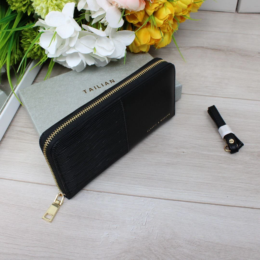 Класичний гаманець чорний: акуратність у діловому стилі