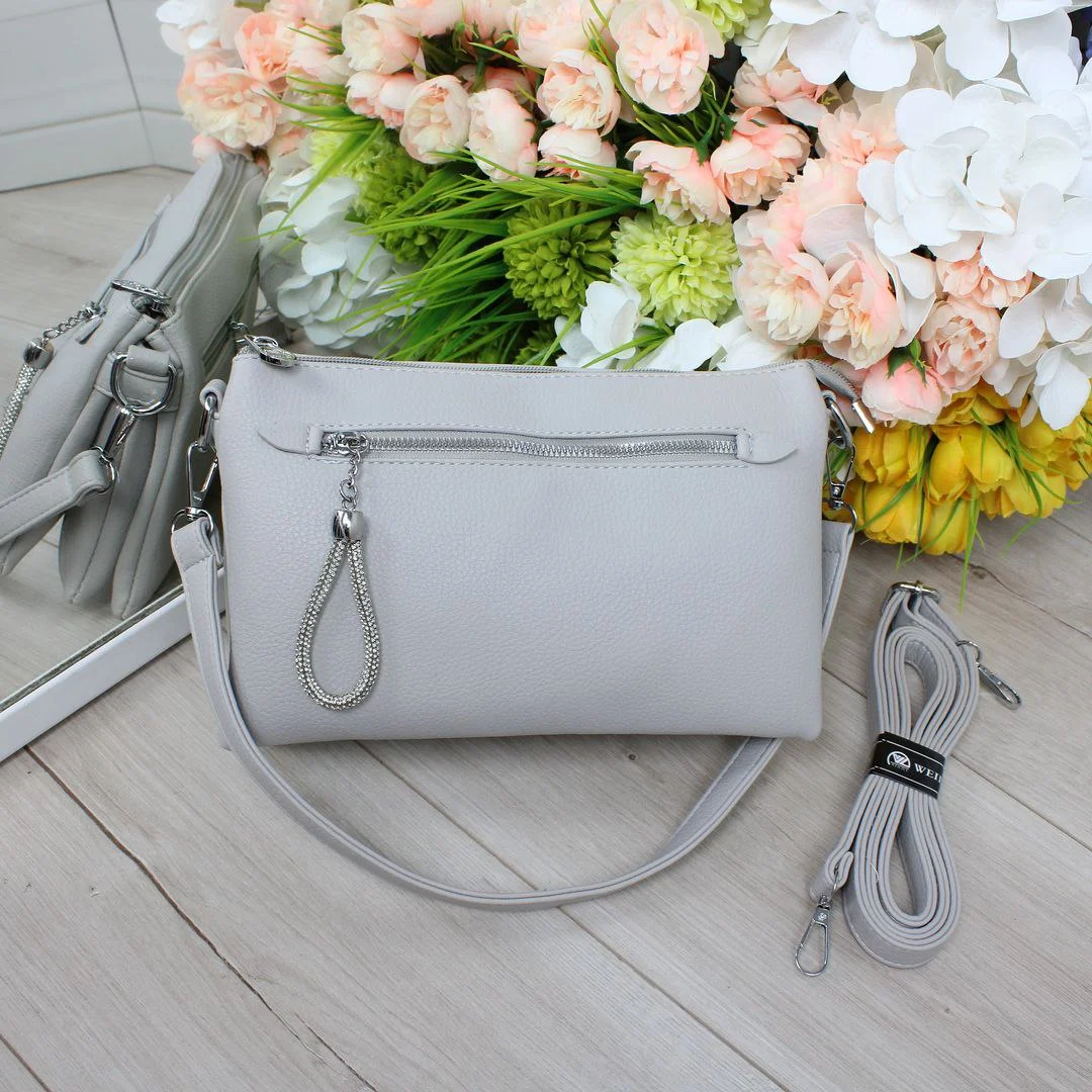 Сіра жіноча сумка крос-боді з екошкіри для подорожей