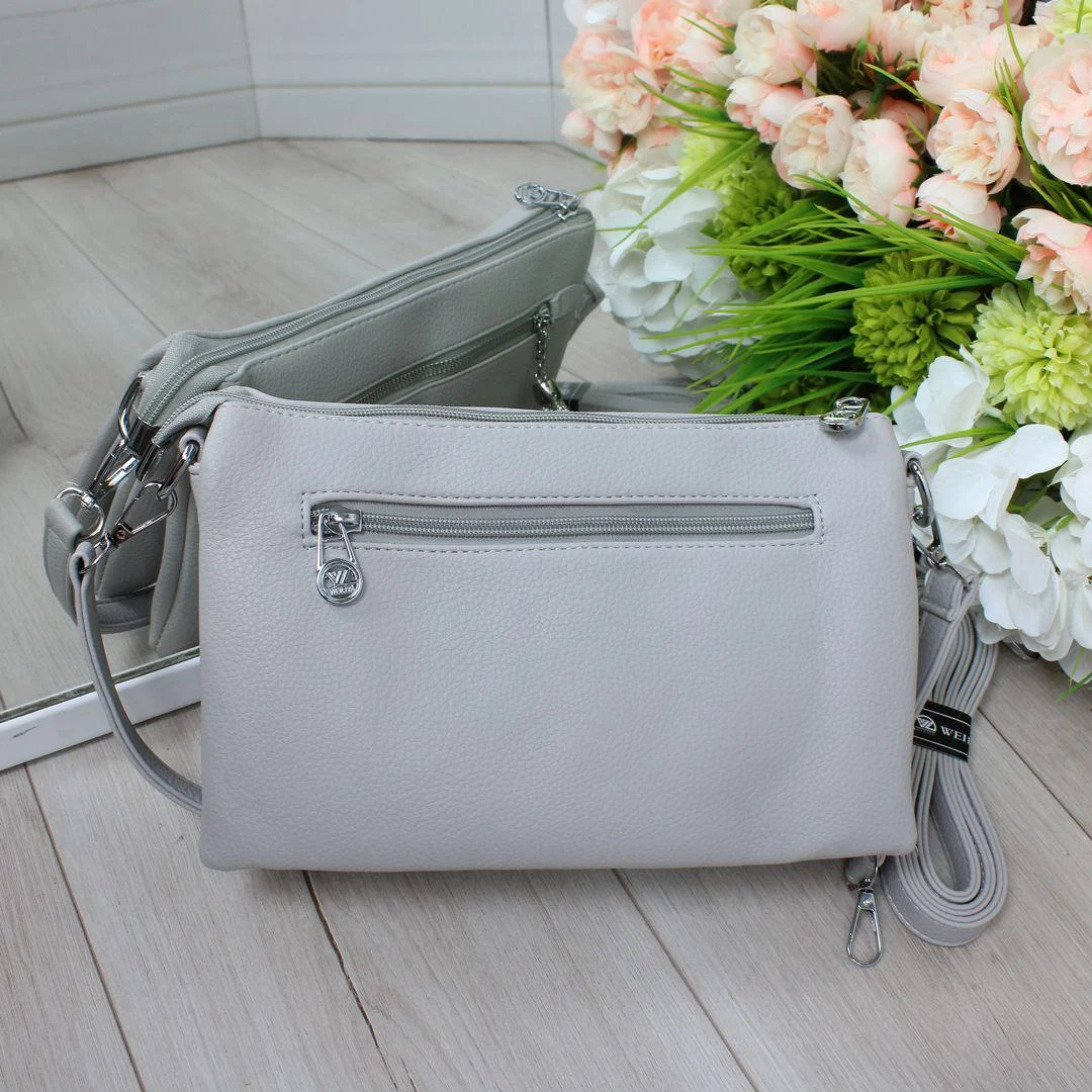 Сіра жіноча сумка крос-боді з екошкіри для подорожей