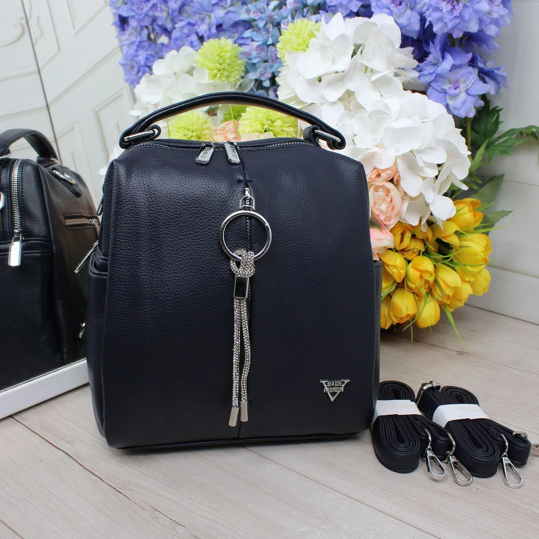 Жіноча сумка-рюкзак для подорожей синя з екошкіри