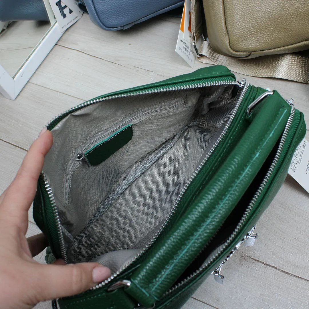 Жіноча зелена сумка з натуральної шкіри на два відділення