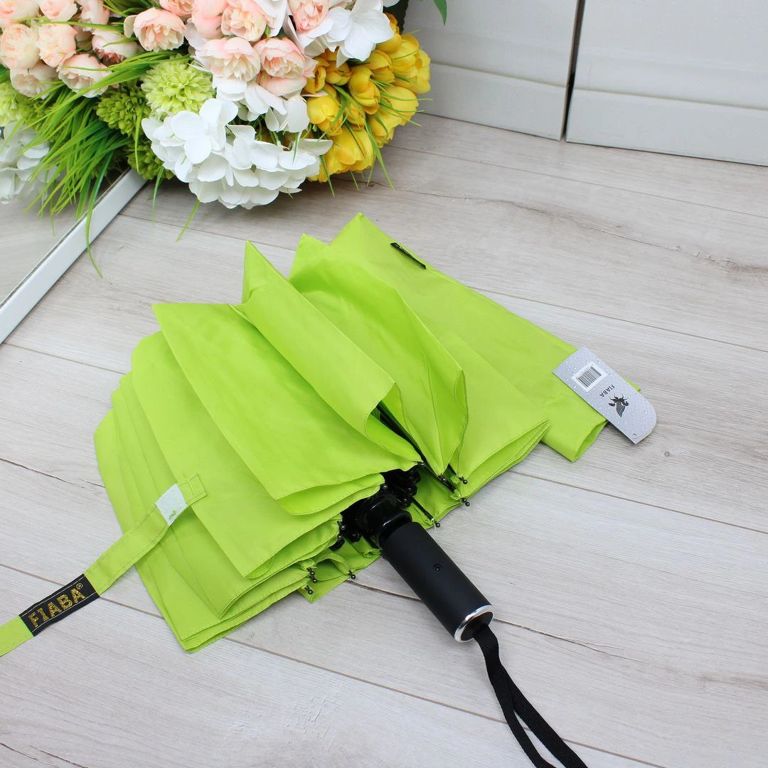 Парасоля автомат Fiaba салатного кольору на 16 спиць з антивітром